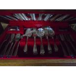 Two canteens of cutlery, one oak cased the other in a teak case