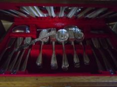 Two canteens of cutlery, one oak cased the other in a teak case