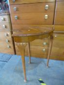 A French style pillar display cabinet, having gilt metal mounts with inlaid panel and a corner table