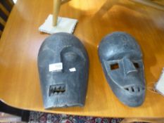 A selection of African style carved wooden face masks - 10