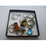 Eight silver rings of various design and stones and a silver mouse pendant