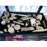 A mixed lot of Ivory and bone carved items, and sundry penknives