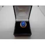 9 carat gold ring with blue stone, possibly Lapis Lazuli
