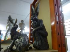 Four hare sculptures by Frith