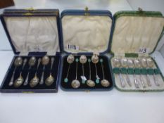 Three sets of silver cased tea and coffee spoons, one hallmarked Sheffield 1946 Cooper Brothers