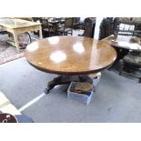 An 18th century style large mahogany circular table