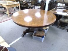 An 18th century style large mahogany circular table