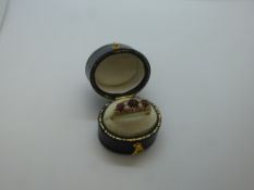 9ct yellow gold dress ring set with garnets and 4 small clear coloured stones, total weight 2.8g