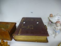 A Victorian musical photo album decorated boating scenes