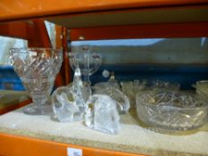 A quantity of cut glass items to include bowls, candlebra, preserving pot, perfume bottle, etc