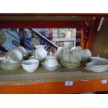 A quantity of Royal Worcester china to include cups, saucers, crescent plates, vegetable dishes