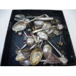 Silver and Silver plated lot including spoons, pins, decanter label, badge, thimbles, etc