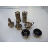 A silver lot comprising of salt and pepper shakers and salts, bowl all hallmarked. Including