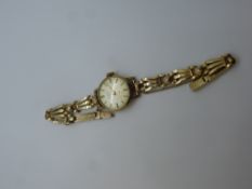 9ct gold Ladies 'Strad' 17 jewel wristwatch, with 9ct case and strap marked 375, total weight approx