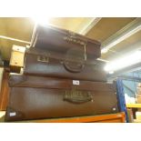 Three vintage suitcases