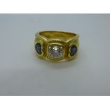 18ct yellow gold wedding band set with central square cut diamond, approx. 1 carat flanked with