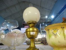 A vintage brass oil lamp