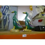 A pair of oriental ducks, one with markings on base