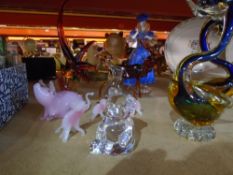 A selection of glass figures to include swans, stag, lady, pig, elephants, bear and hare