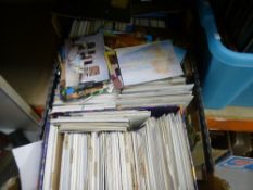 A box of assorted post cards