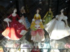 Six Royal Doulton figures of ladies