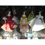 Six Royal Doulton figures of ladies