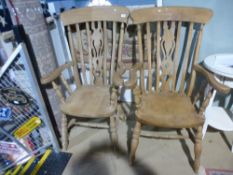 Two similar slat back kitchen armchairs