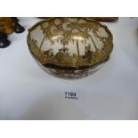 An antique Satsuma bowl having shaped rim, the interior decorated female figures on bridge, 12 cms