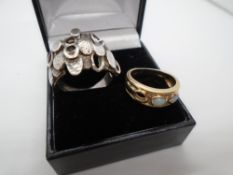 9 carat gold ring with two Opal stones, third stone is missing - gross weight approx 2.9g, plus a