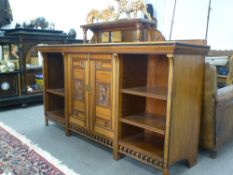 Doveston, Bird and Hull; an Aesthetic movement walnut sideboard with mirrored superstructure,