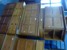 A similar pair of Nathan teak sideboards and two other items