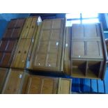 A similar pair of Nathan teak sideboards and two other items