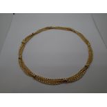 9 carat gold necklace made of four intertwined strands, approx 28.8g