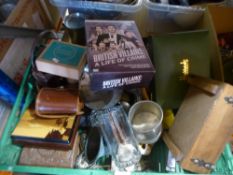 A box of mixed collectables, including cameras, car badges, wooden boxes