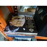 A quantity of vinyl LPs of mixed genre to include Johnny Cash, Burt Bacharach, The Carpenters, Abba,