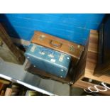 Four mixed vintage suitcases