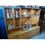 Mid century teak wall unit with glazed bookcase, open bookcase and drop down desk above drawers