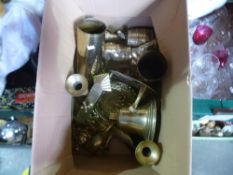 A box of brass items including bell, candle sticks, horse brasses along with a box of mixed items