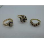 Two 9ct gold dress rings, one an opal and sapphire cluster ring, another sapphire floral design