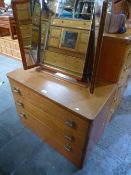 A Stag teak dressing chest and a matching larger chest