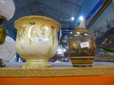 A ceramic decorated planter along with a 70s Denby jug