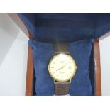 Cased gents Rotary 'Elite' wristwatch with 9ct gold case on brown leather strap, marked 375