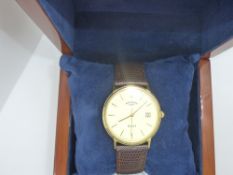 Cased gents Rotary 'Elite' wristwatch with 9ct gold case on brown leather strap, marked 375