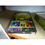 A cased vintage compendium of games, to include drafts, chess and dominoes, etc
