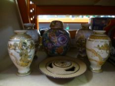 A quantity of oriental vases, a ginger jar and a metal dish