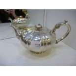 An ornate Irish silver teapot in what appears in undamaged condition. Hallmarked Dublin 1803,