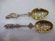 Two similar Continental white metal serving spoons, with marks to the bowl, dated 1778