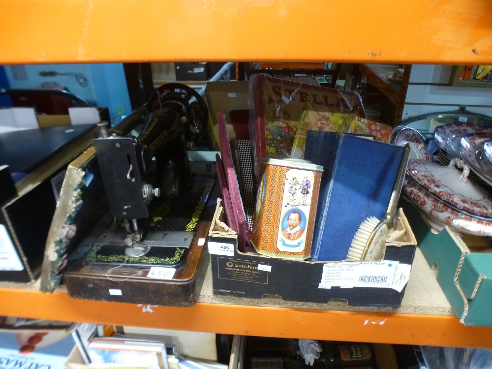 Box of mixed collectables, including books, puzzles, pictures and a Singer sewing machine