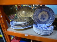 A quantity of blue and white plates and oval platters including Spode and Burleigh examples
