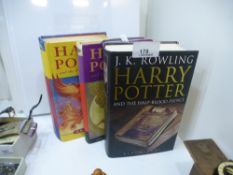 Three First Editions hardback Harry Potter books to include a first edition